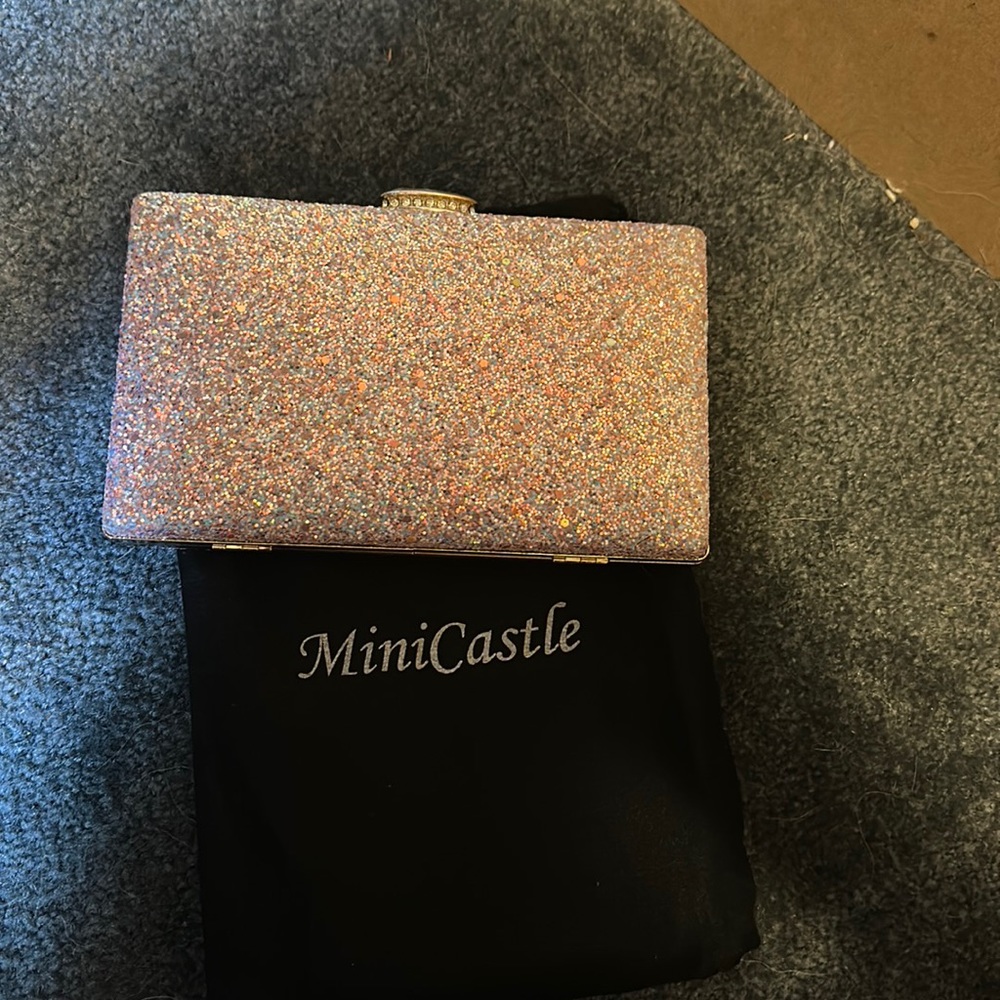 Hand clutch, excellent condition.  Never used